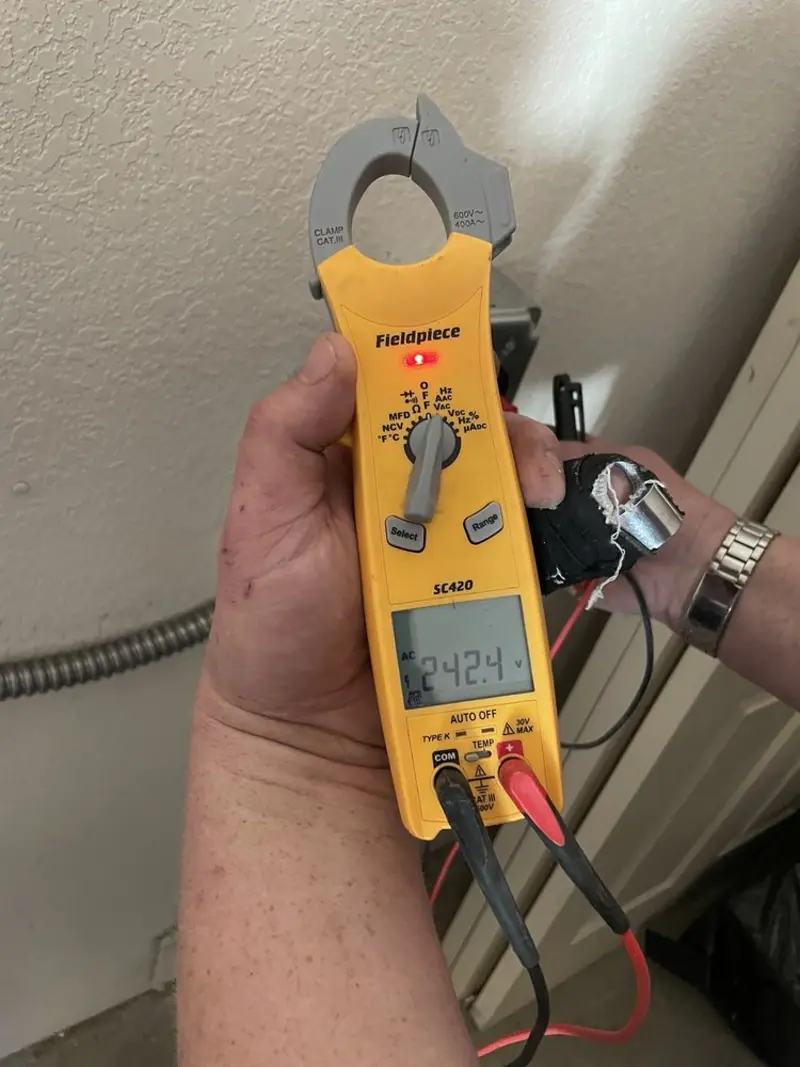 Voltage testing with clamp meter during Circuit Breaker Repair in Fountain Inn